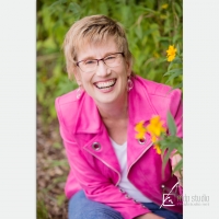 Teresa Romain, Champion For Women Who Experience Scarcity With Money